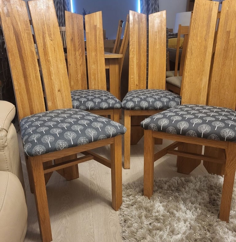 Solid oak round back chairs 