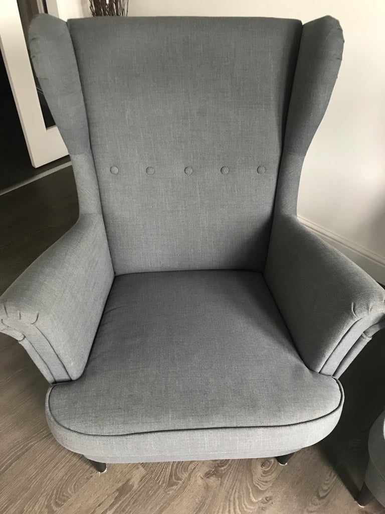 2 grey fabric high backed wing tipped chair with matching 2 grey fabric footstools, £140 for all 