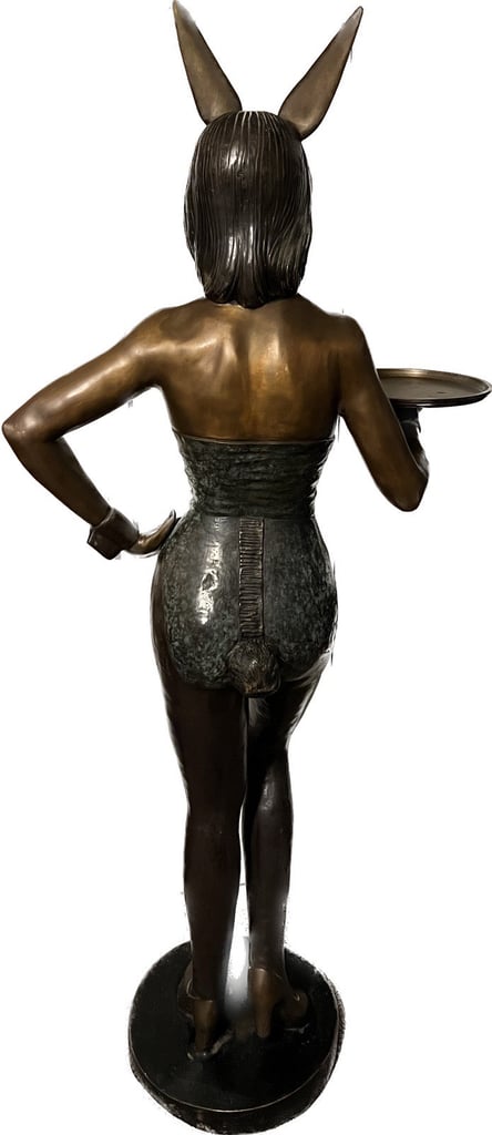 Solid bronze playboy bunny statue