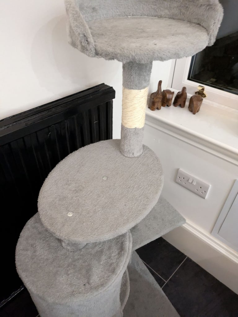 Cat tree 2 months old grey £20 very good condition.