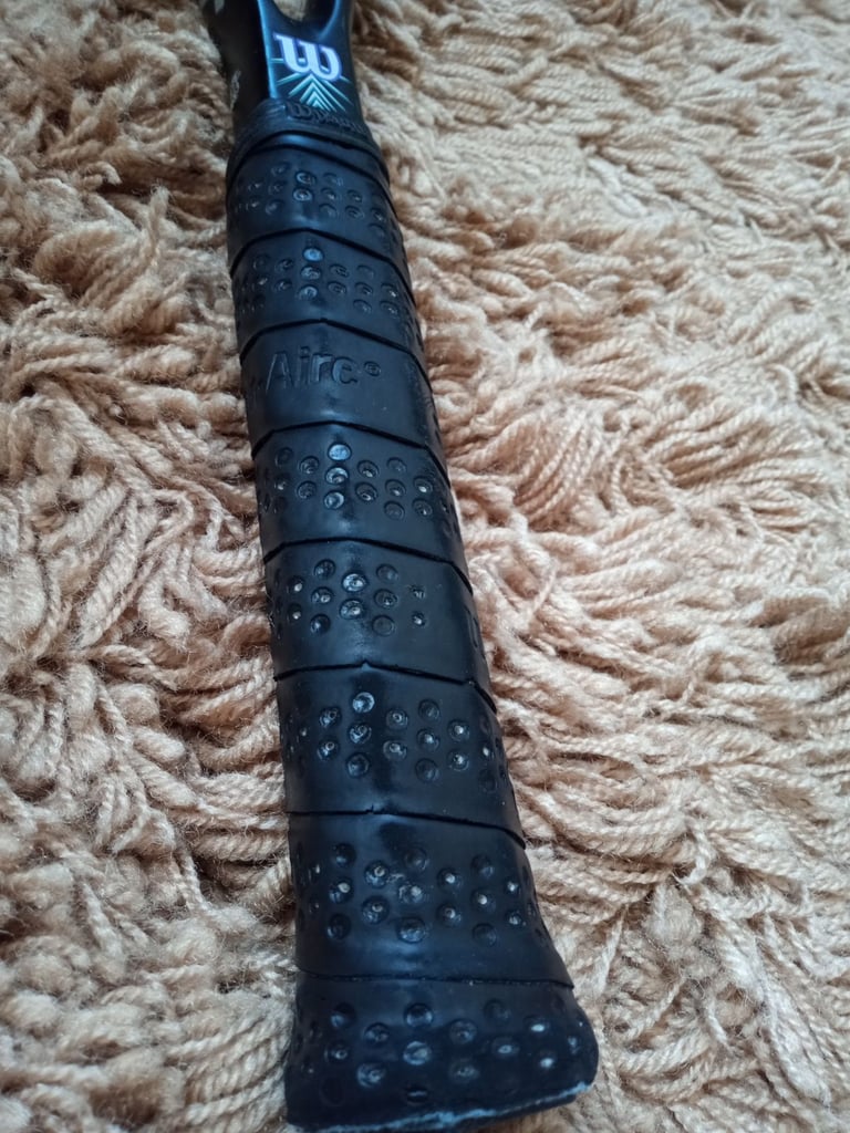 Tennis racquet, barely used 