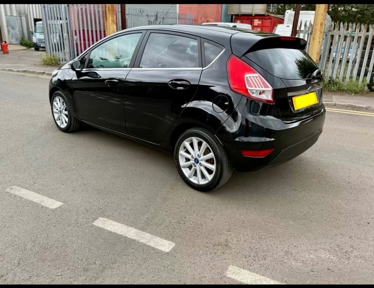 Ford fiesta titanium 1.5 diesel black 5 door 65 reg 70k miles bargain price may px 