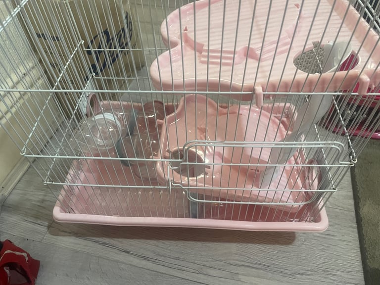 Pink hamster cage