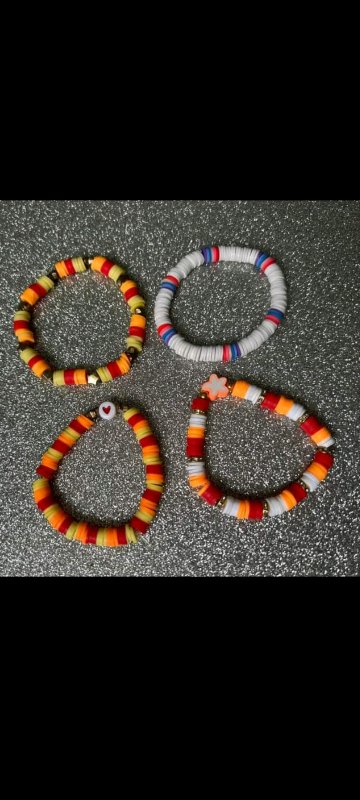 Bracelets any colour's and can add little charms what ever you want al