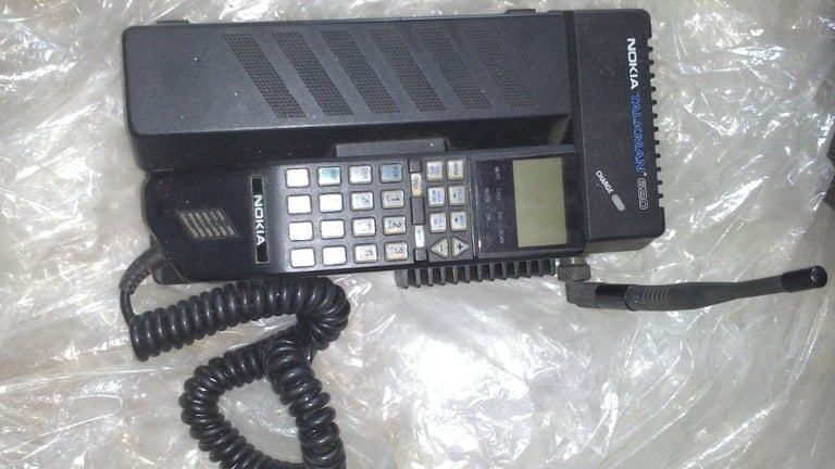 Vintage retro Nokia Talkman 620 mobile phone with case.