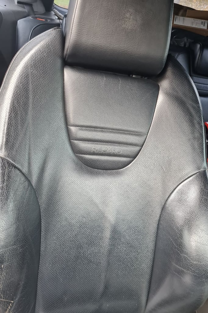 Black leather recaro sports seats.