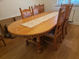 Solid Oak Dining table, 8 chairs, and sideboard 