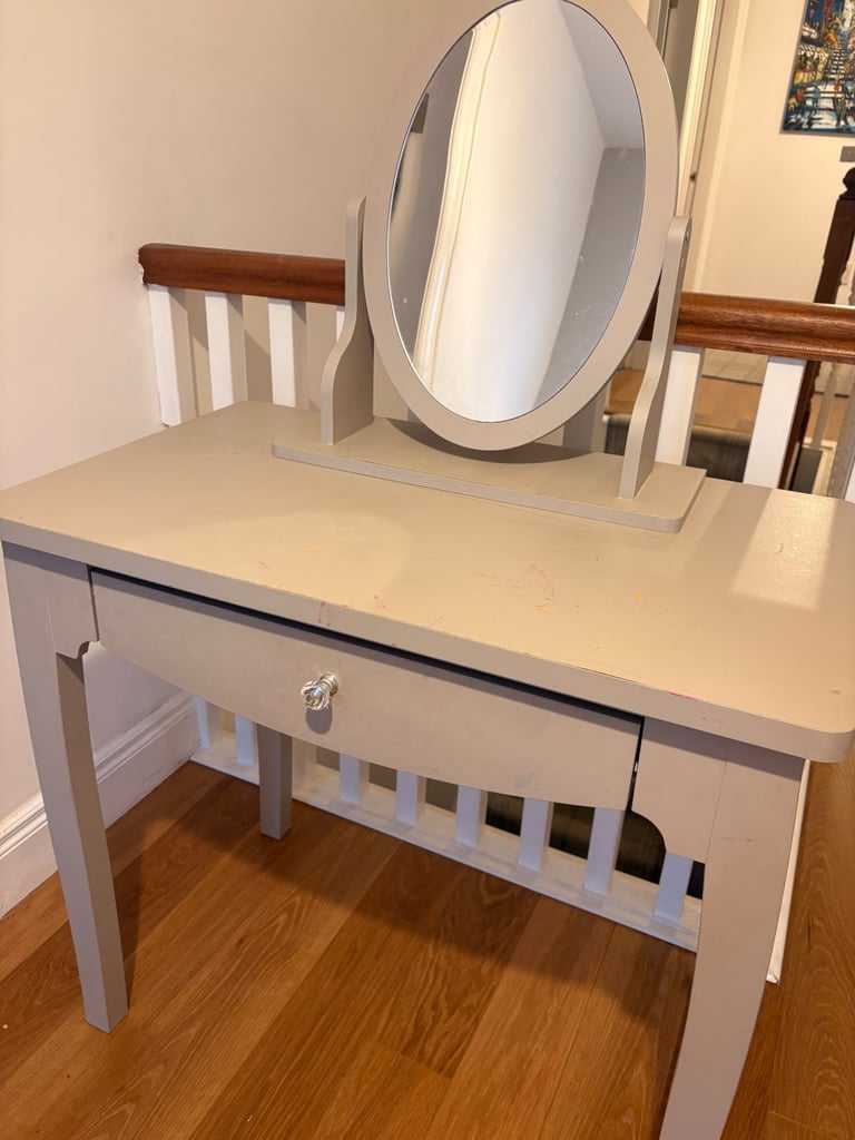 Grey dressing table with attached mirror and one drawer 