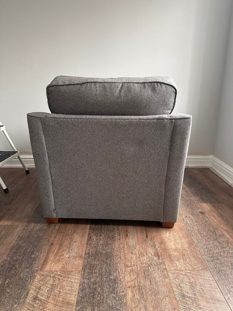 DFS grey armchair 