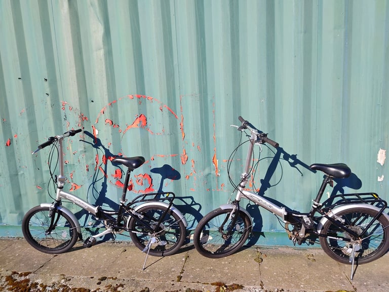 Apollo Transition folding bikes with bags