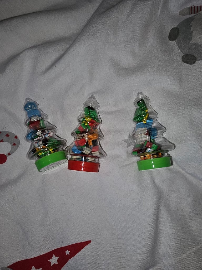 Mini novelty Christmas rubbers/erasers in a Christmas tree tub £2 each