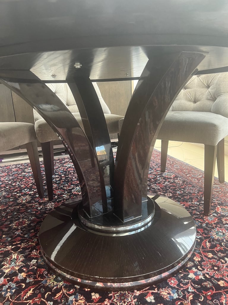 Luxury wooden dining table and velvet chairs 