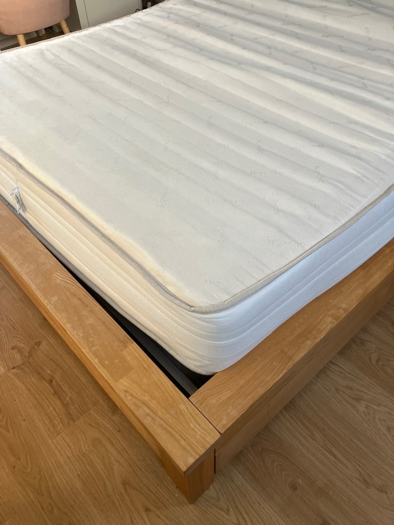 Oak King Size Wooden bed frame with four underbed wheeled drawers 