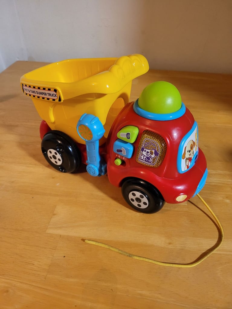 Vtech put and take dumper truck lights and sounds with ball. Good condition