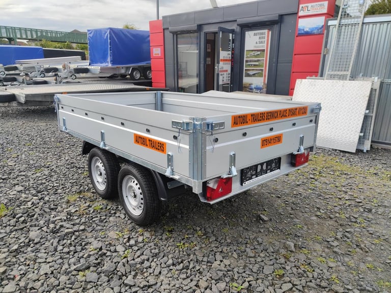 image for BRAND NEW 8,2ft x 5ft Twin Axle Hochlander Trailer With Drop Down Sides 1300KG ALKO Braked