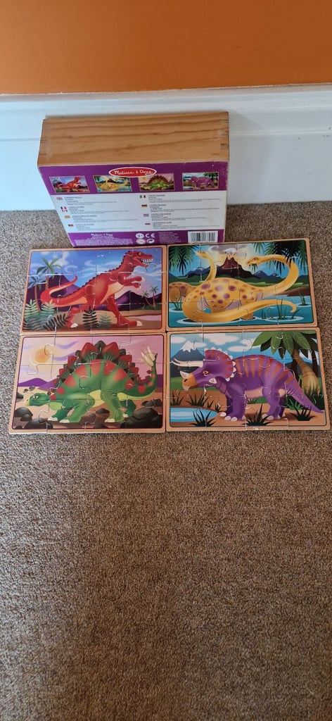 MELISSA AND DOUG 4 DINOSAUR JIGSAW PUZZLES IN BOX. EXCELLENT CONDITION.