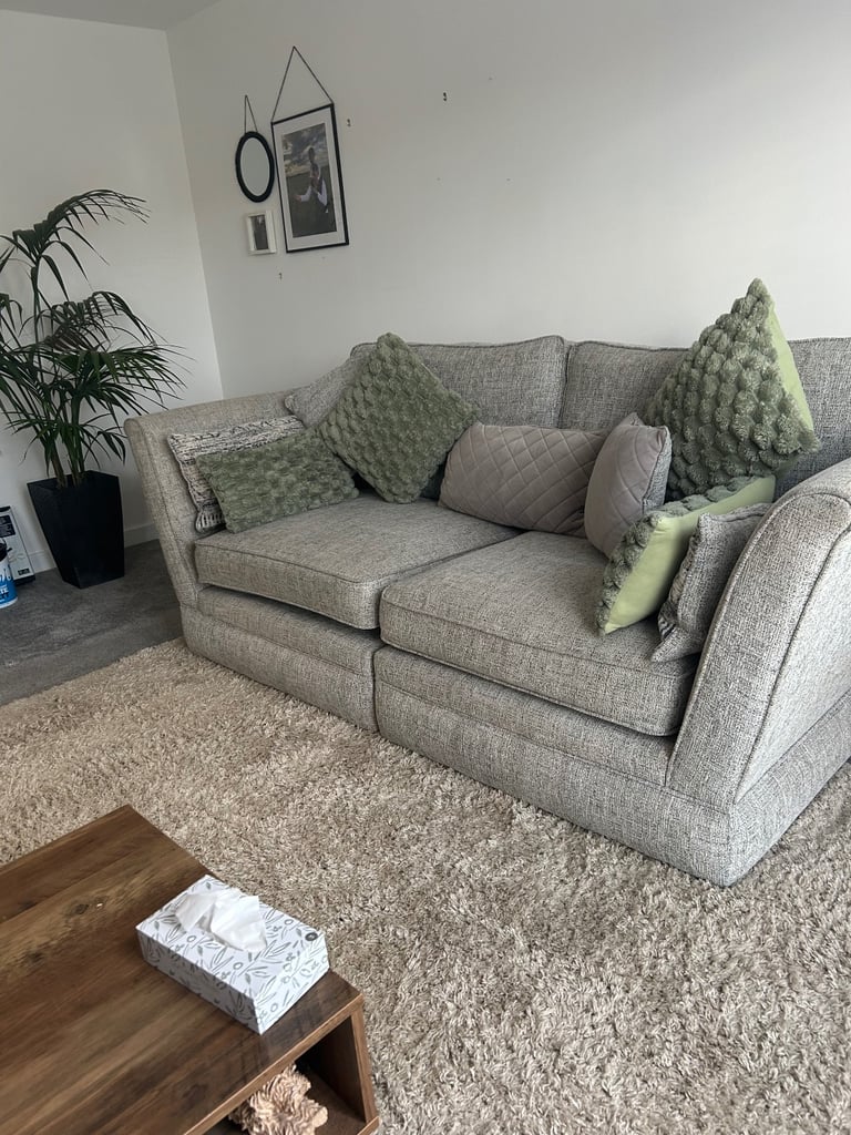 Just in Time for Christmas!! Large 3 seater couch with love chair and a free pouffie 