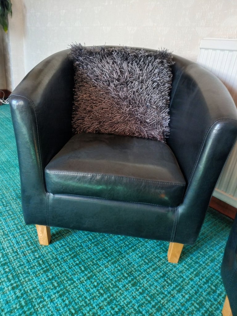 Pair of black armchairs