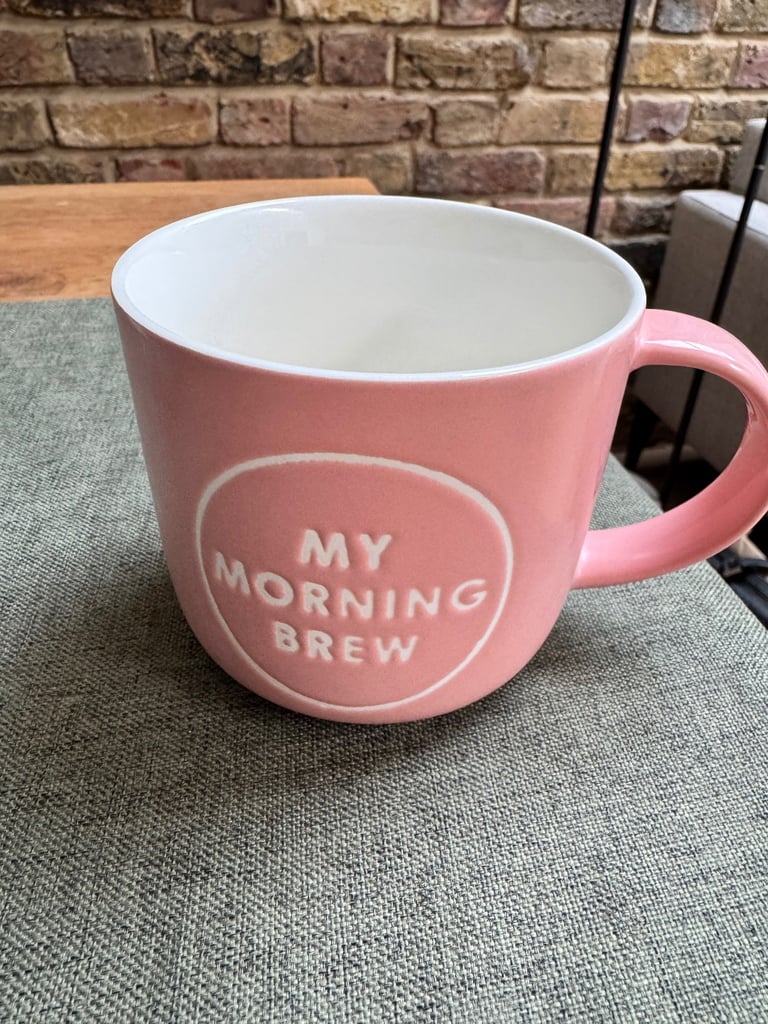 Four colourful mugs