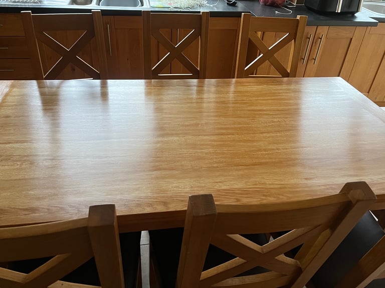 Solid Oak 8 seater table and chairs 