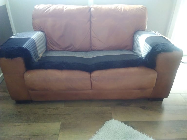 £20 two seater Buffalo Hide ( leather ) sofa with fire safety certificate 