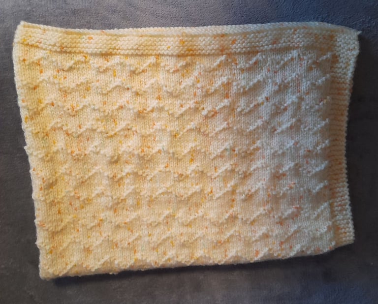 Hand knitted babies blanket 
