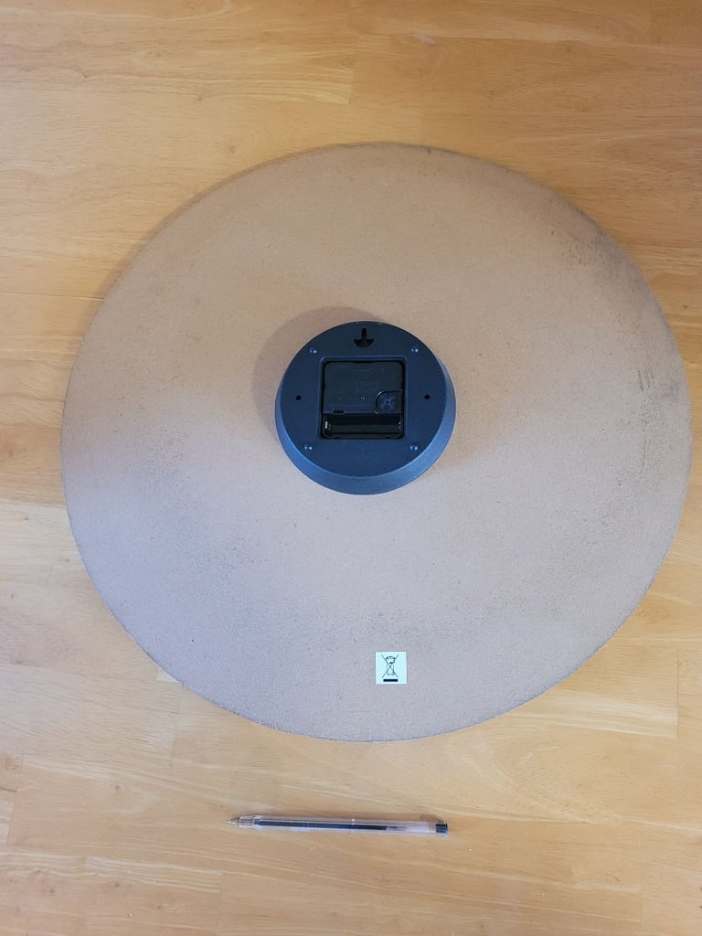 Large 'ANTIQUES' wood effect wall clock. Good condition.