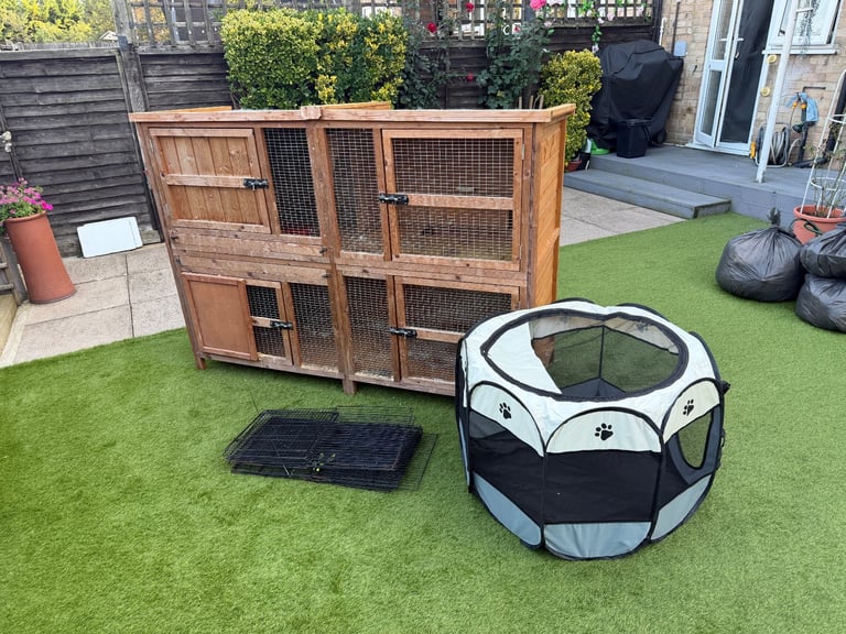image for 2 Tier Hutch, Mobile Cage, Pen, Run & bottles FREE TO TAKE