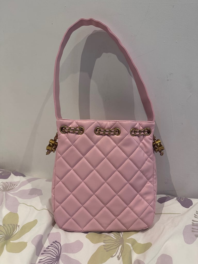 image for Leather shoulder bag in light pink colour.