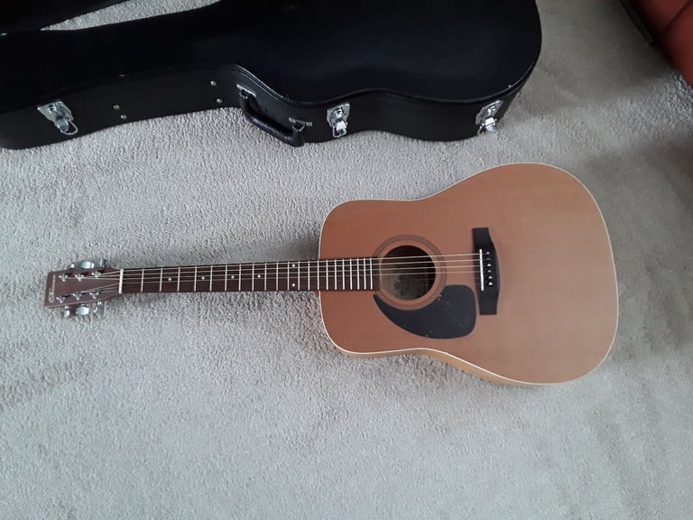 Left handed Norman B18 acoustic guitar, made in canada.