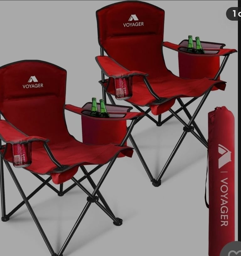 A new pair of burgundy folding light weight camping chairs with 