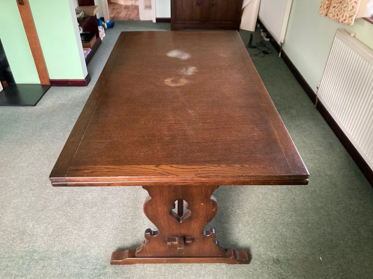Dark mahogany finish dining table and six chairs