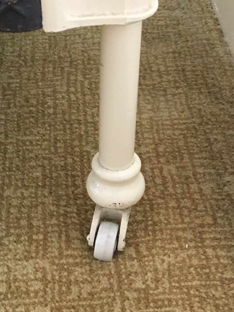 Vintage French brass & cream cast iron single bed on brass & china castors 