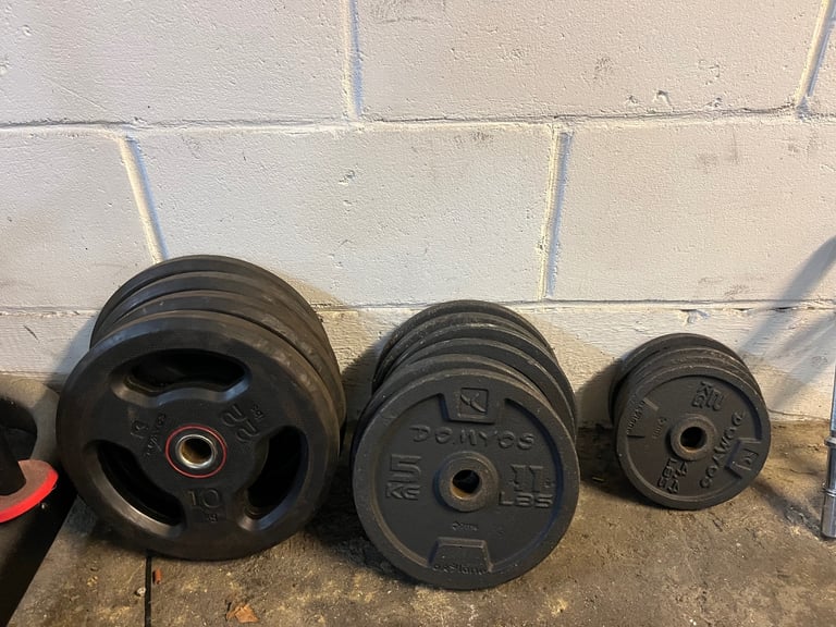 Rack + bench + bar + weights + dumbbell 