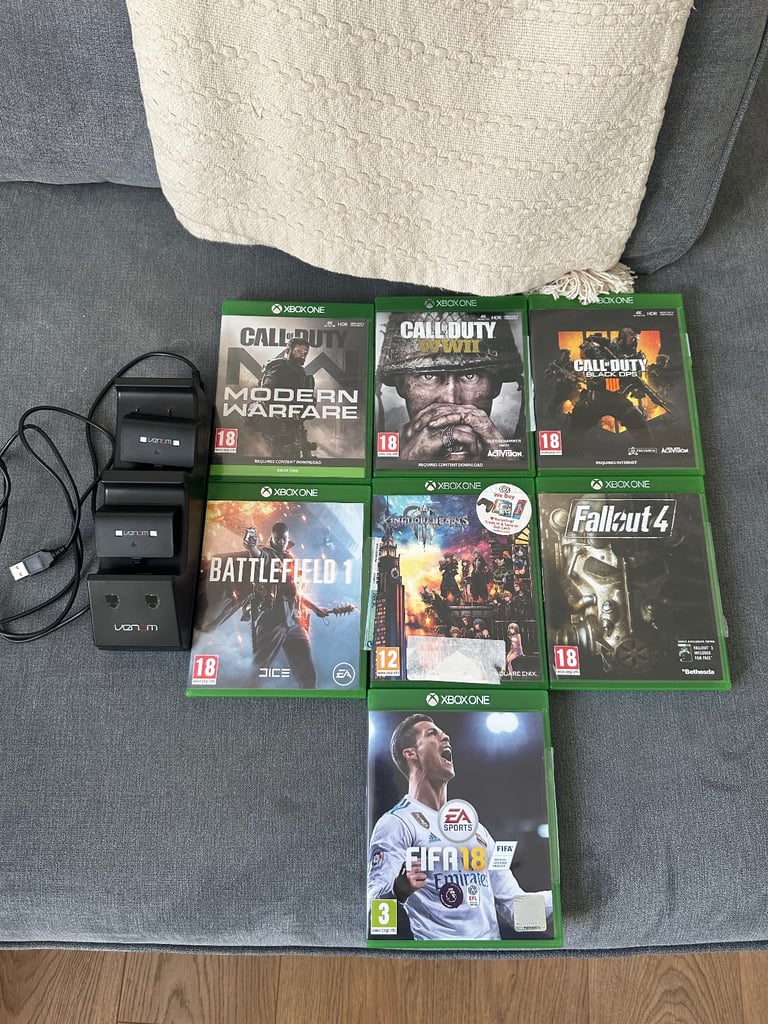image for Xbox one games and Venom Xbox one charging dock