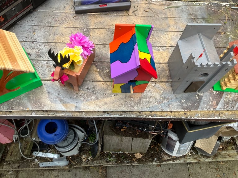 Handmade and painted bird boxes 