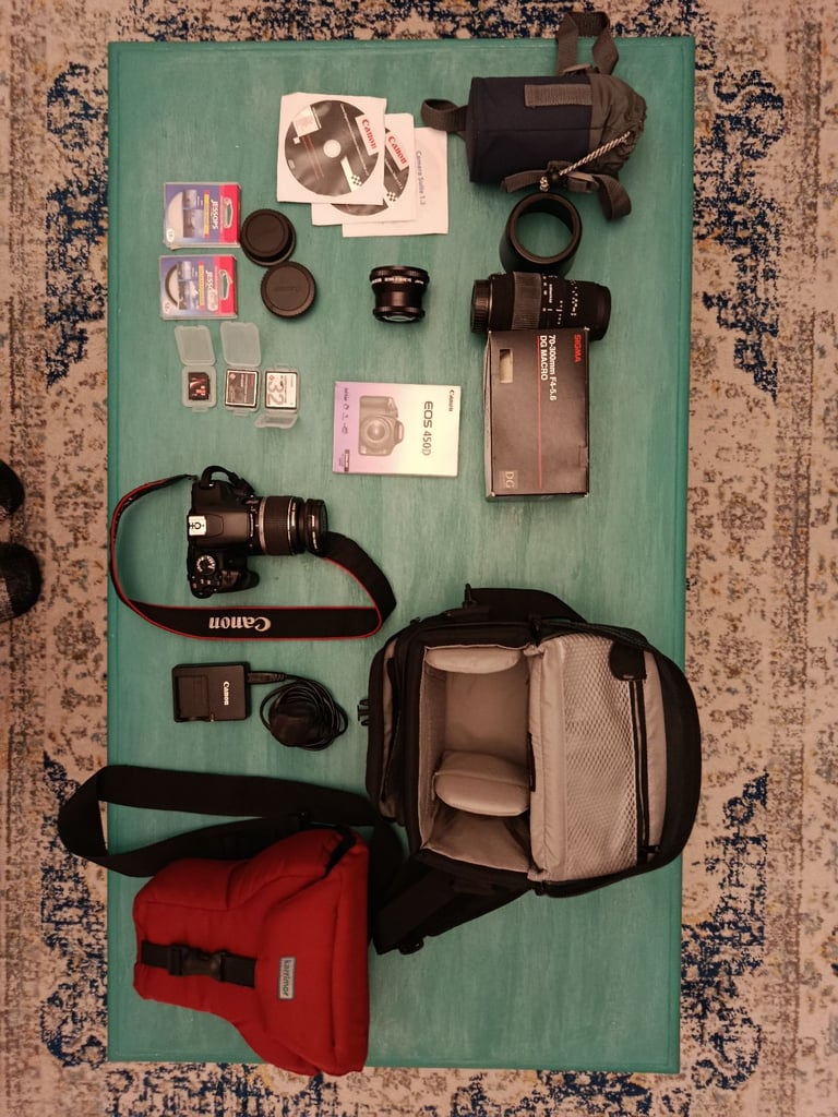 image for Canon EOS 450D DSLR, Sigma 70-300mm Macro lens, charger, Panagor Semi-fisheye lens, bags etc