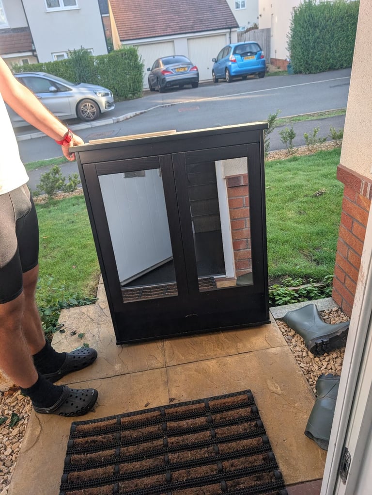 Black Ikea bathroom cabinet with mirrors