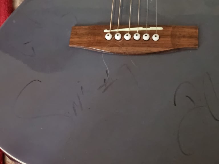 Signed acoustic guitar 