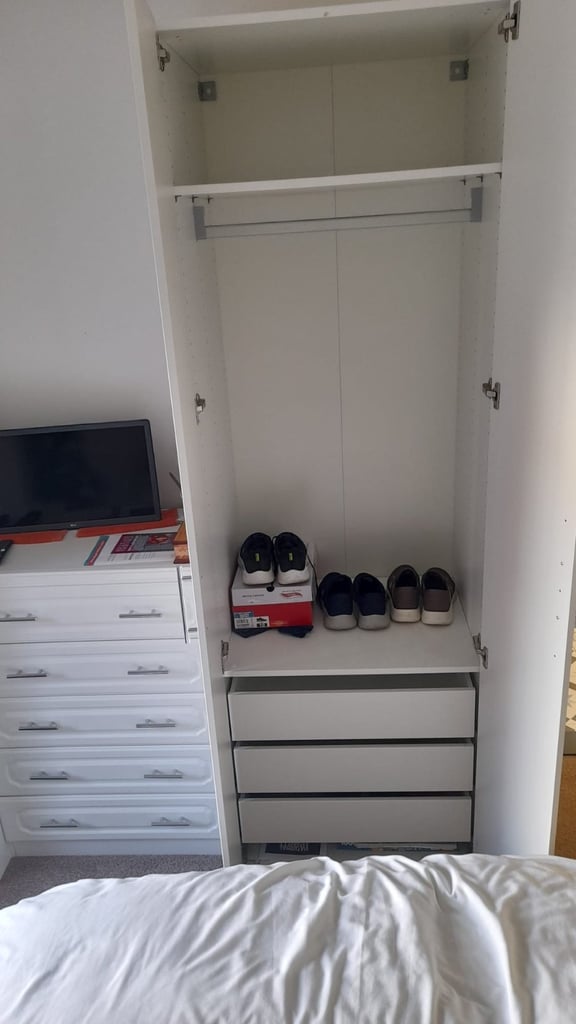 2x white wardrobes