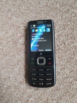 Nokia 6700 Classic with box, charger manual and accessories shown - retro vintage