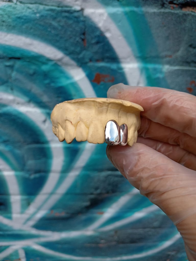 Custom made double cap silver grillz 