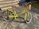 Girls yellow bike 