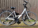 Apollo Elyse Hybrid bike with mudguards, chainguard, rear rack carrier in excellent condition.