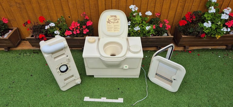 Whole complete toilet unit for camper conversion.