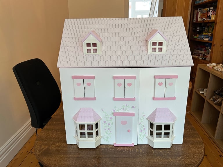 Wooden dolls house and furniture