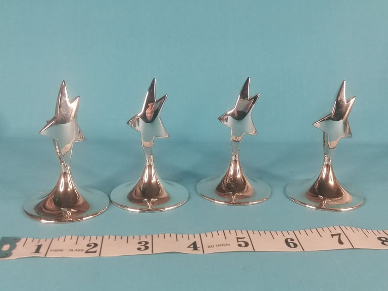 Stainless steel STAR PLACE CARD HOLDER. As seen.