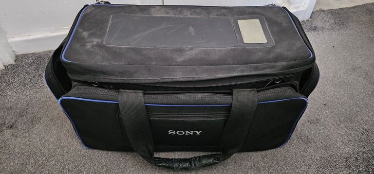 Sony camcorder bag with strap.