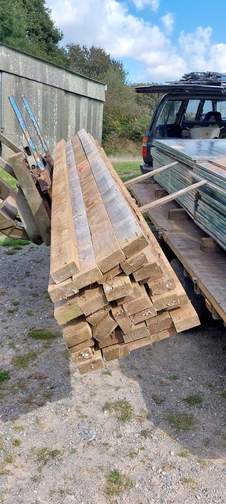 used salvaged wooden beams and posts
