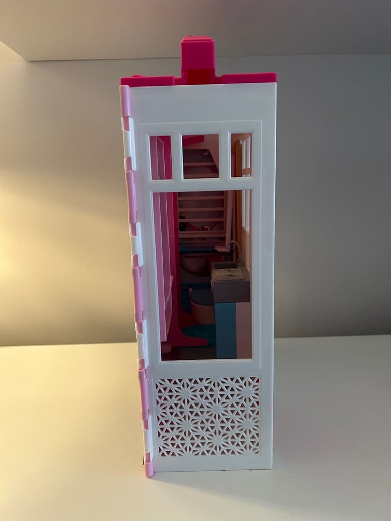 Barbie portable house and dolls bundle